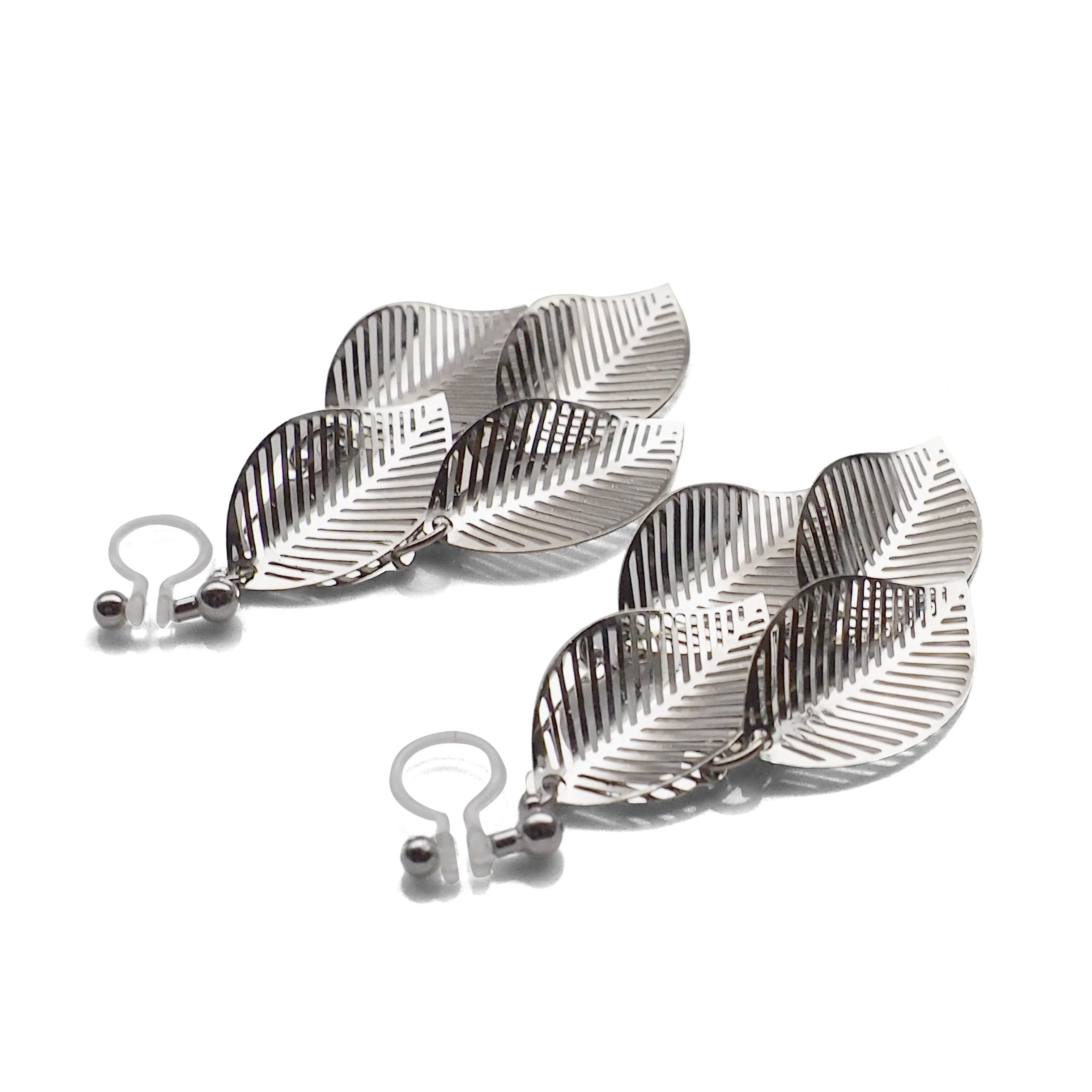 Silver four leaf filigree invisible clip on earrings