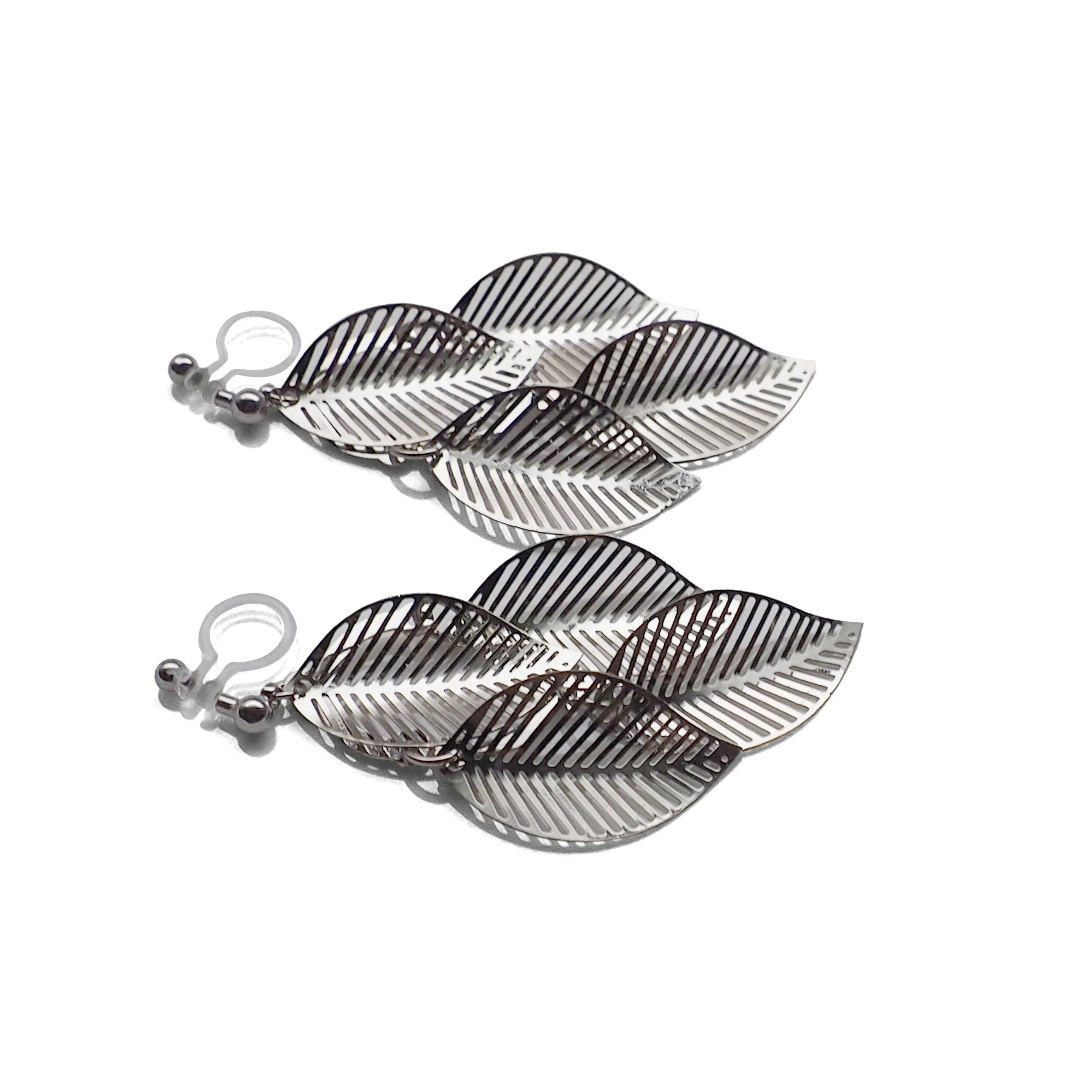 Silver four leaf filigree invisible clip on earrings