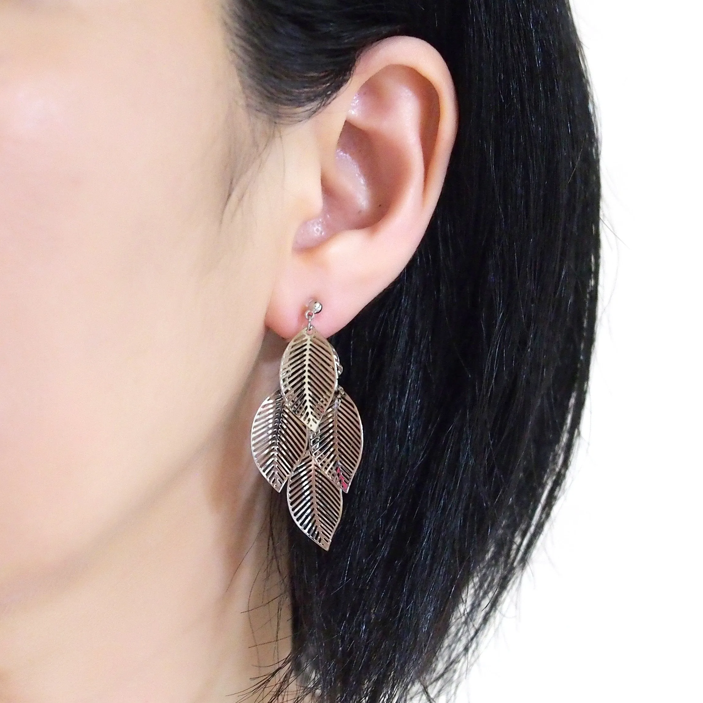 Silver four leaf filigree invisible clip on earrings